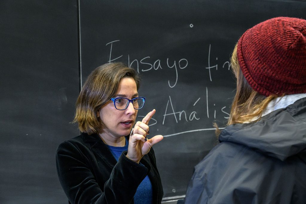 Professor explaining a concept with her hands
